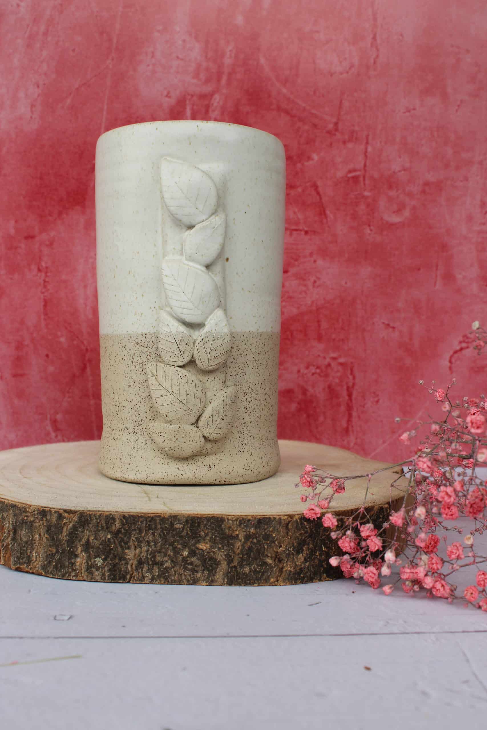 Le vase et son feuillage