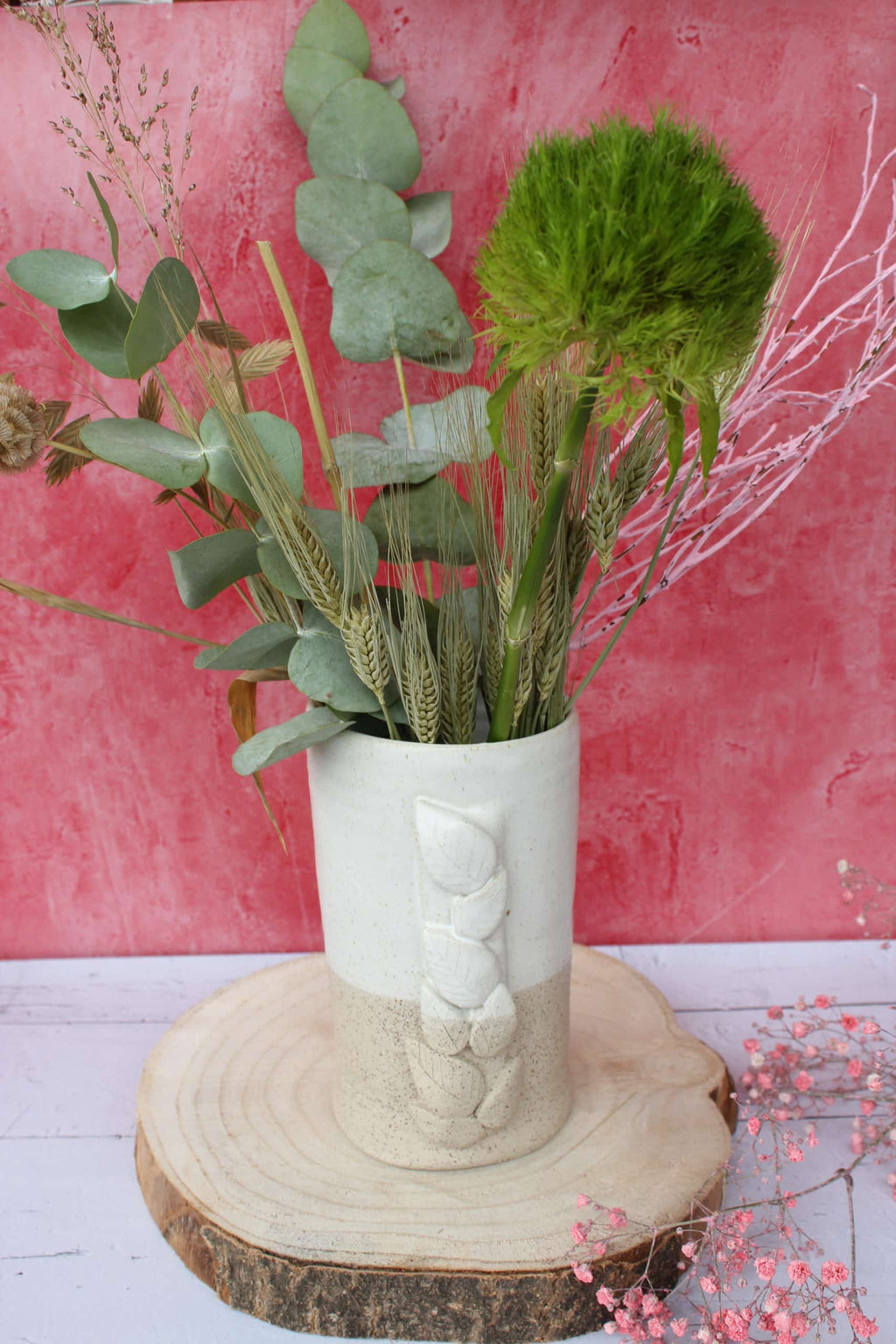 Le vase et son feuillage