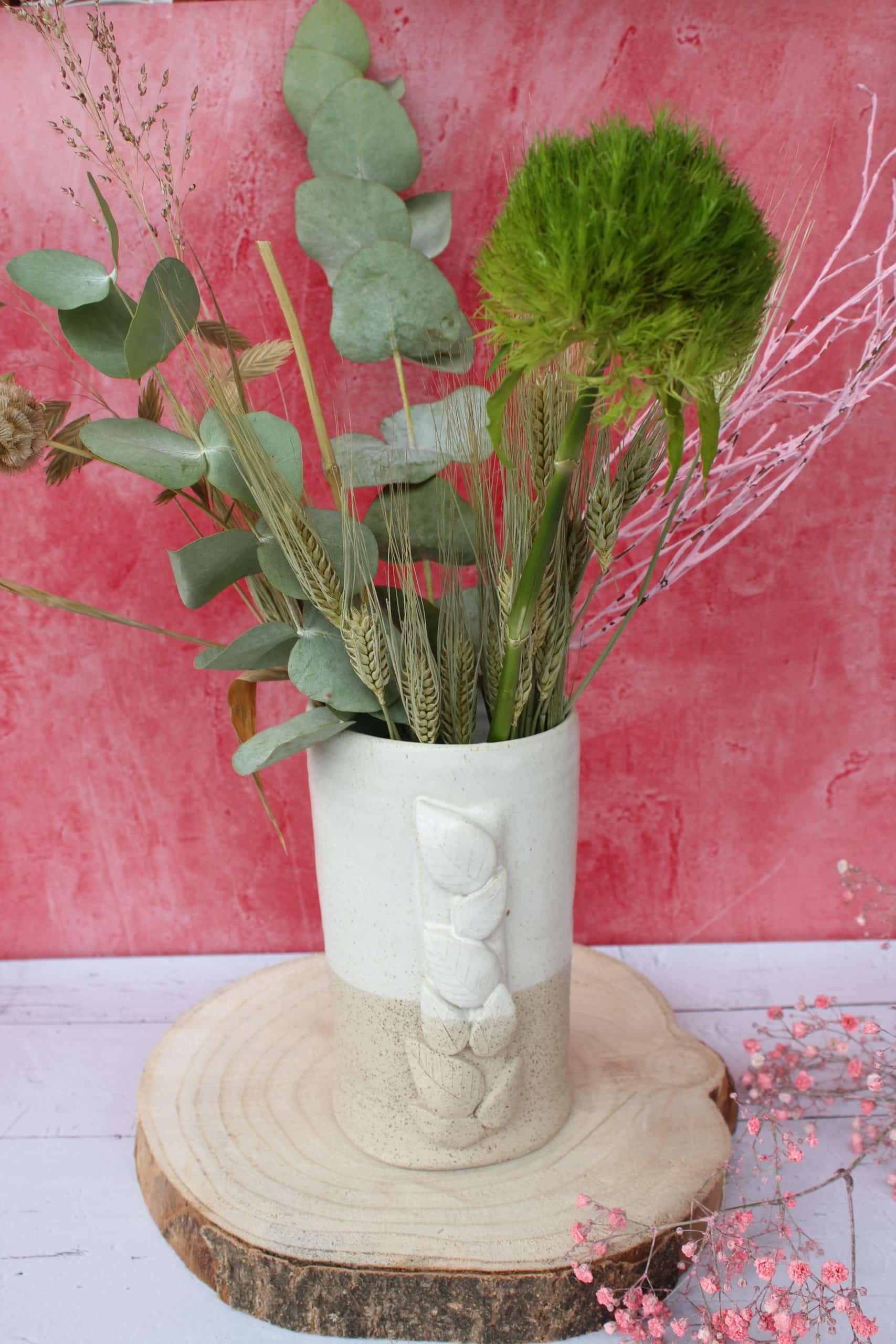 Le vase et son feuillage