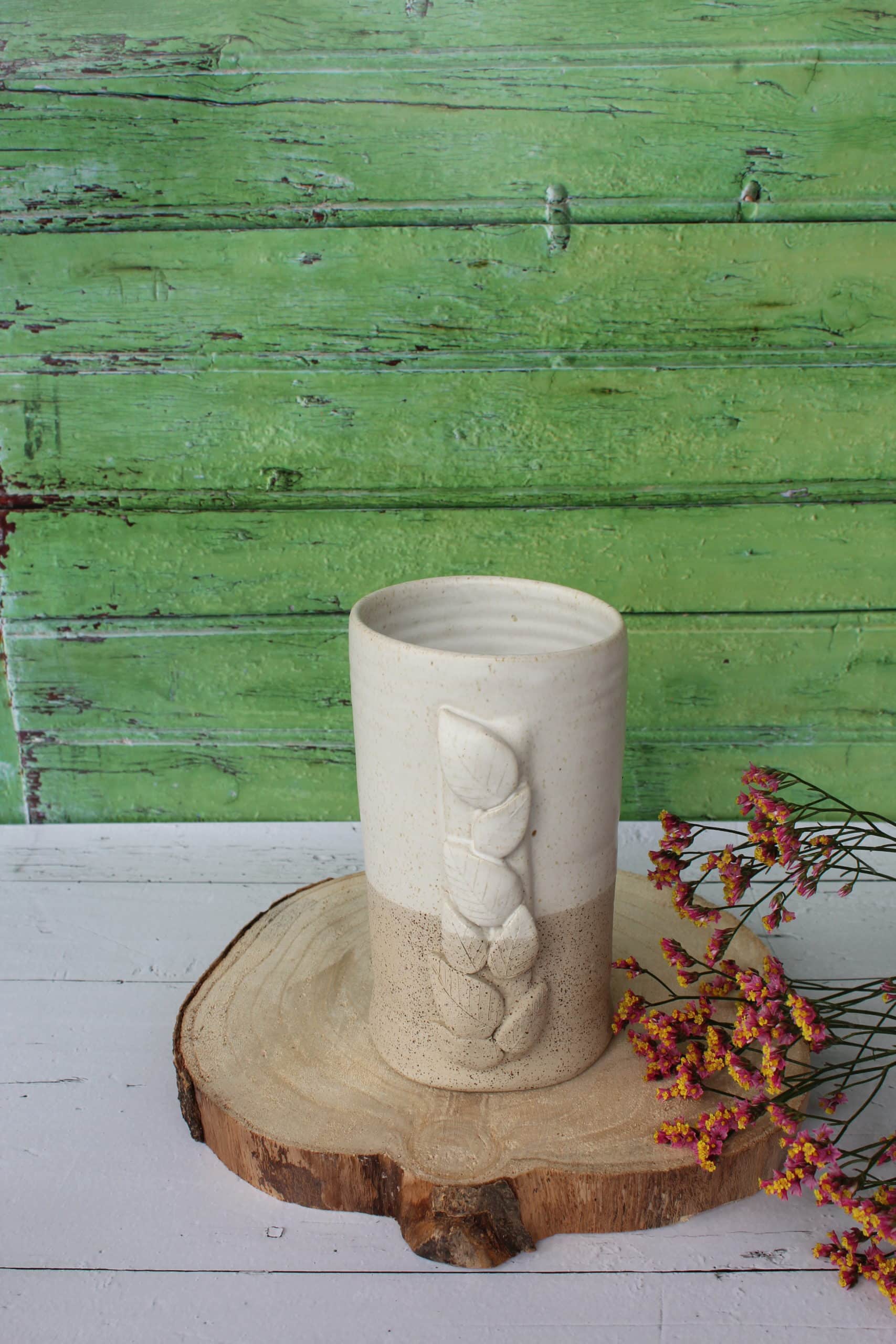 Le vase et son feuillage