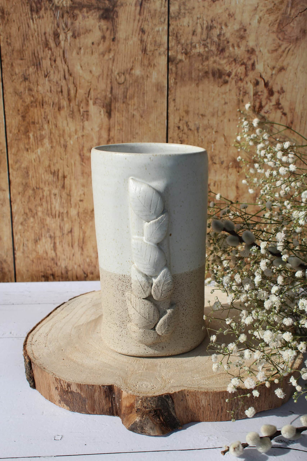 Le vase et son feuillage