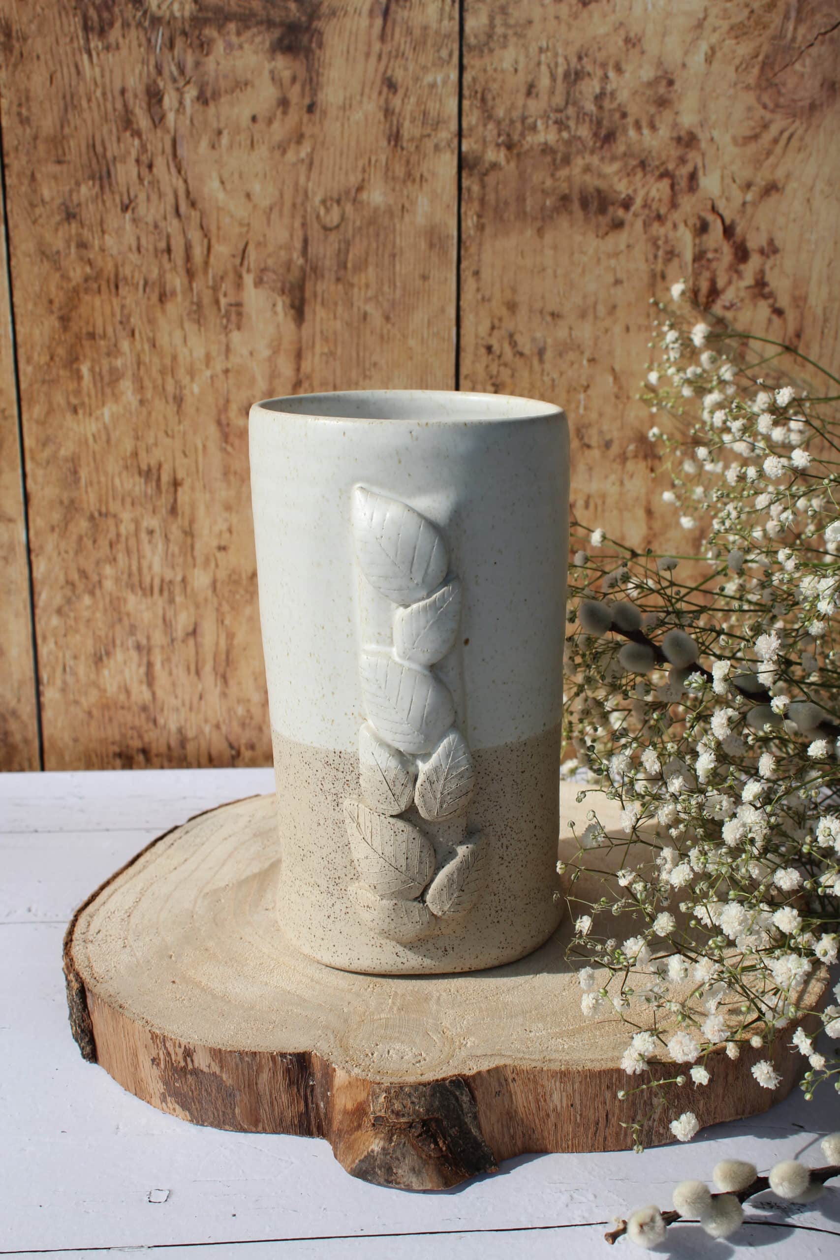 Le vase et son feuillage