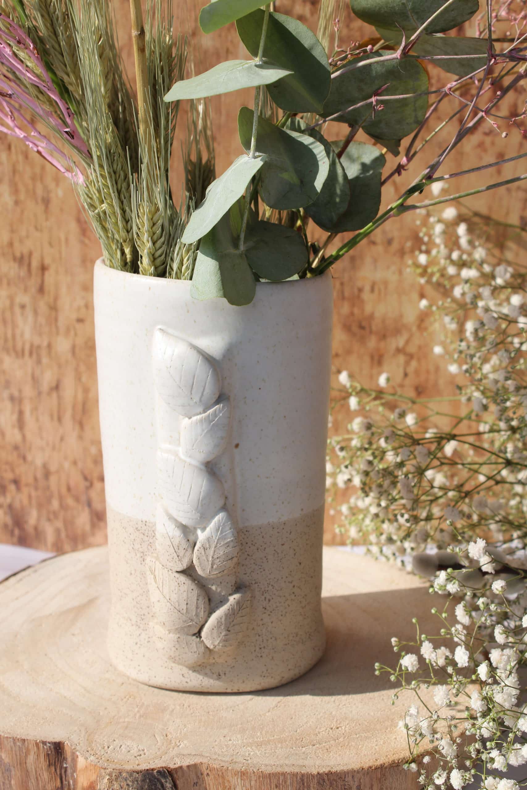 Le vase et son feuillage