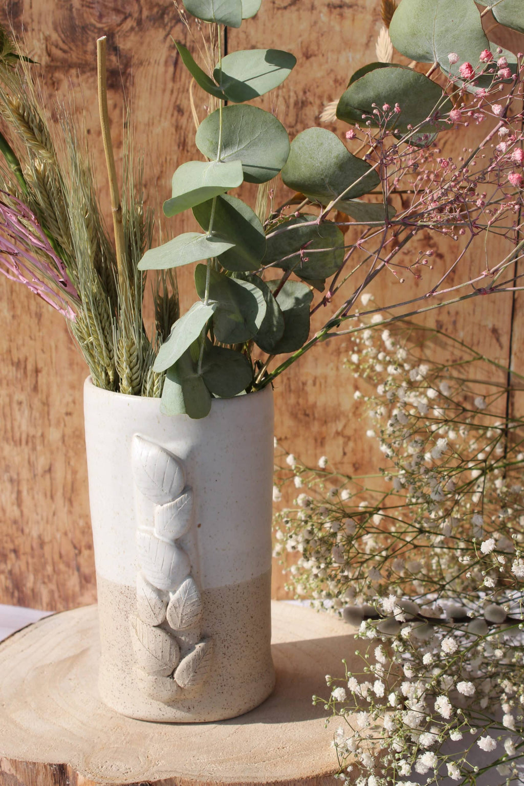 Le vase et son feuillage