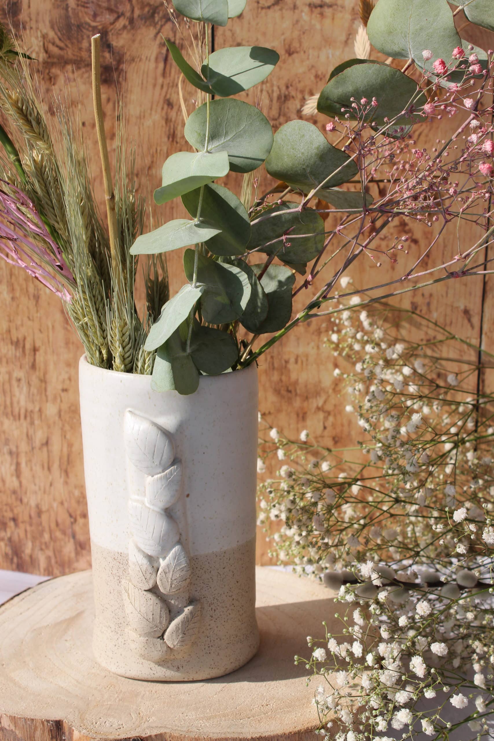 Le vase et son feuillage